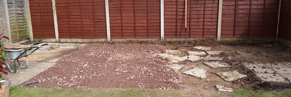 Breaking up and removal
of existing patio